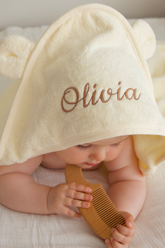 Personalised cream baby hooded towel with embroidered name Olivia